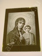 Икона Казанской Божьей Матери на золотом зеркале выполнена лазерной гравировкой. Размеры любые.
